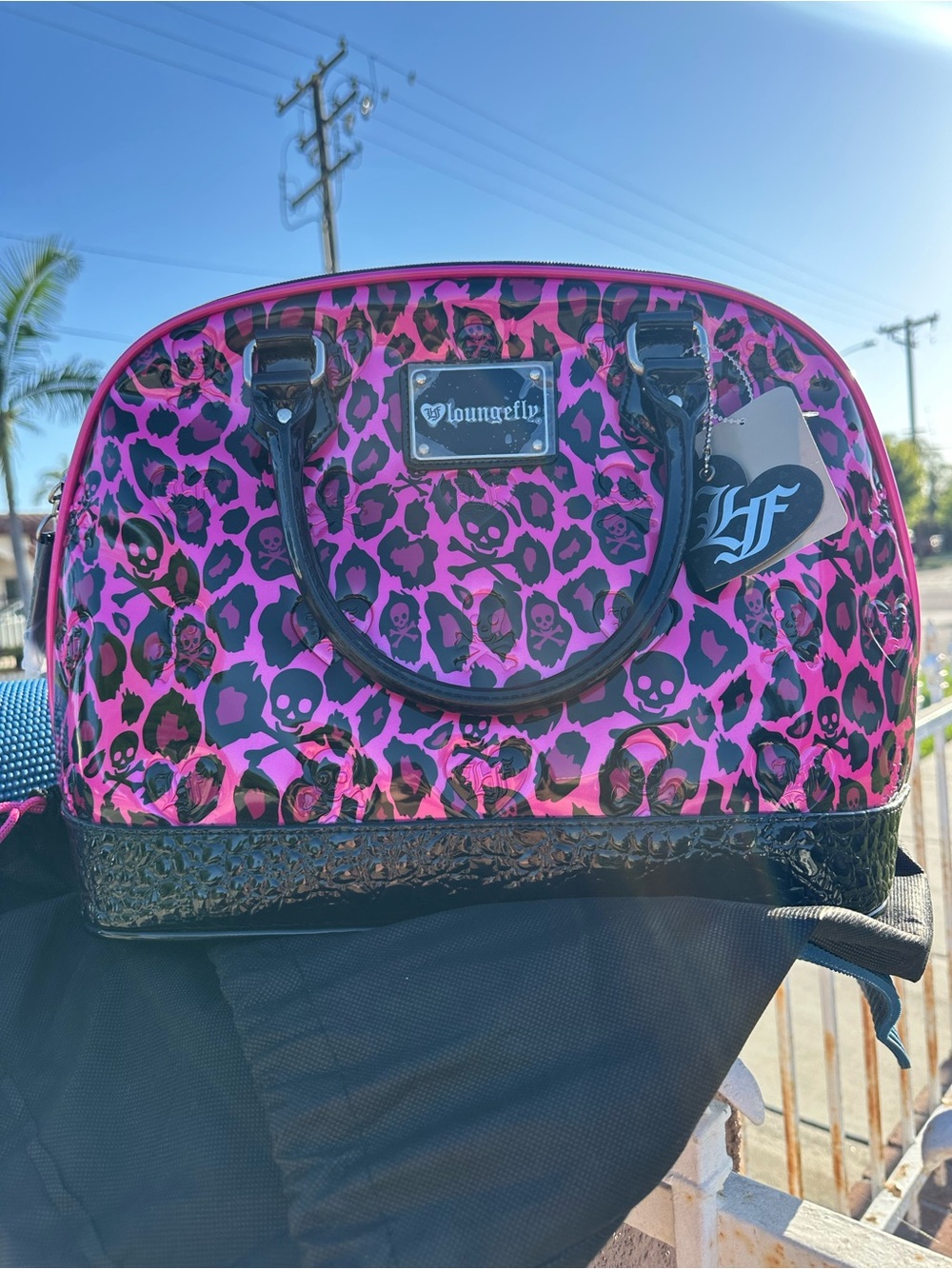 Loungefly Black and Hot Pink Leopard Skull Satchel